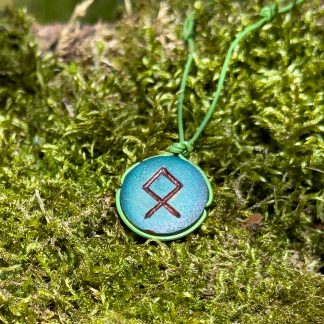 Hand carved and colored Othala rune wooden medallion